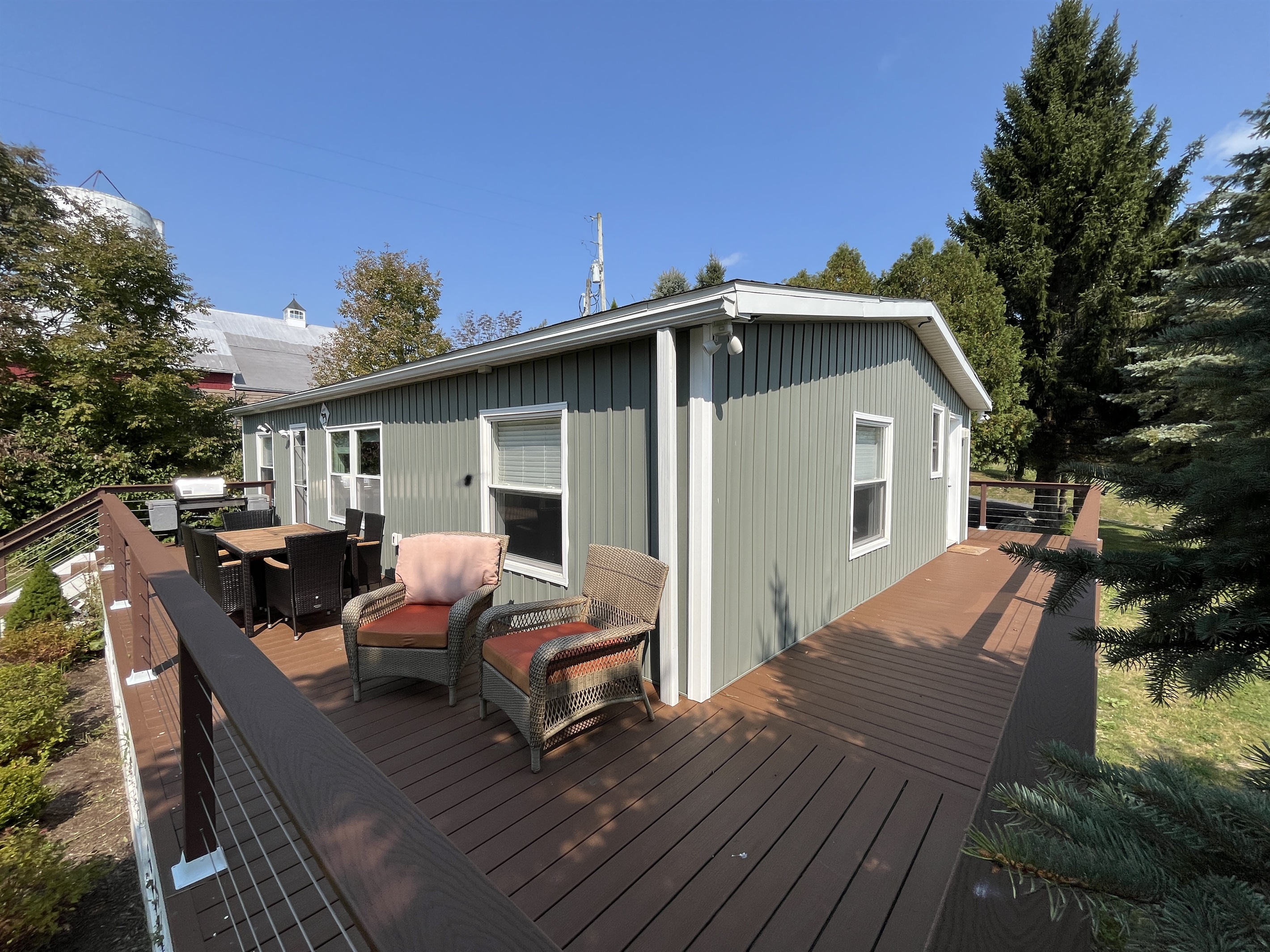 Large wrap around deck with pond(s) view