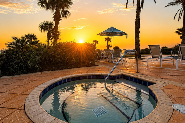 End a sun-filled day with a warm soak as the sky turns to fire over the ocean. There's something magical about this golden hour—shoulders relaxing, kids giggling in the bubbles, the whole family unwinding together beneath the swaying palms.