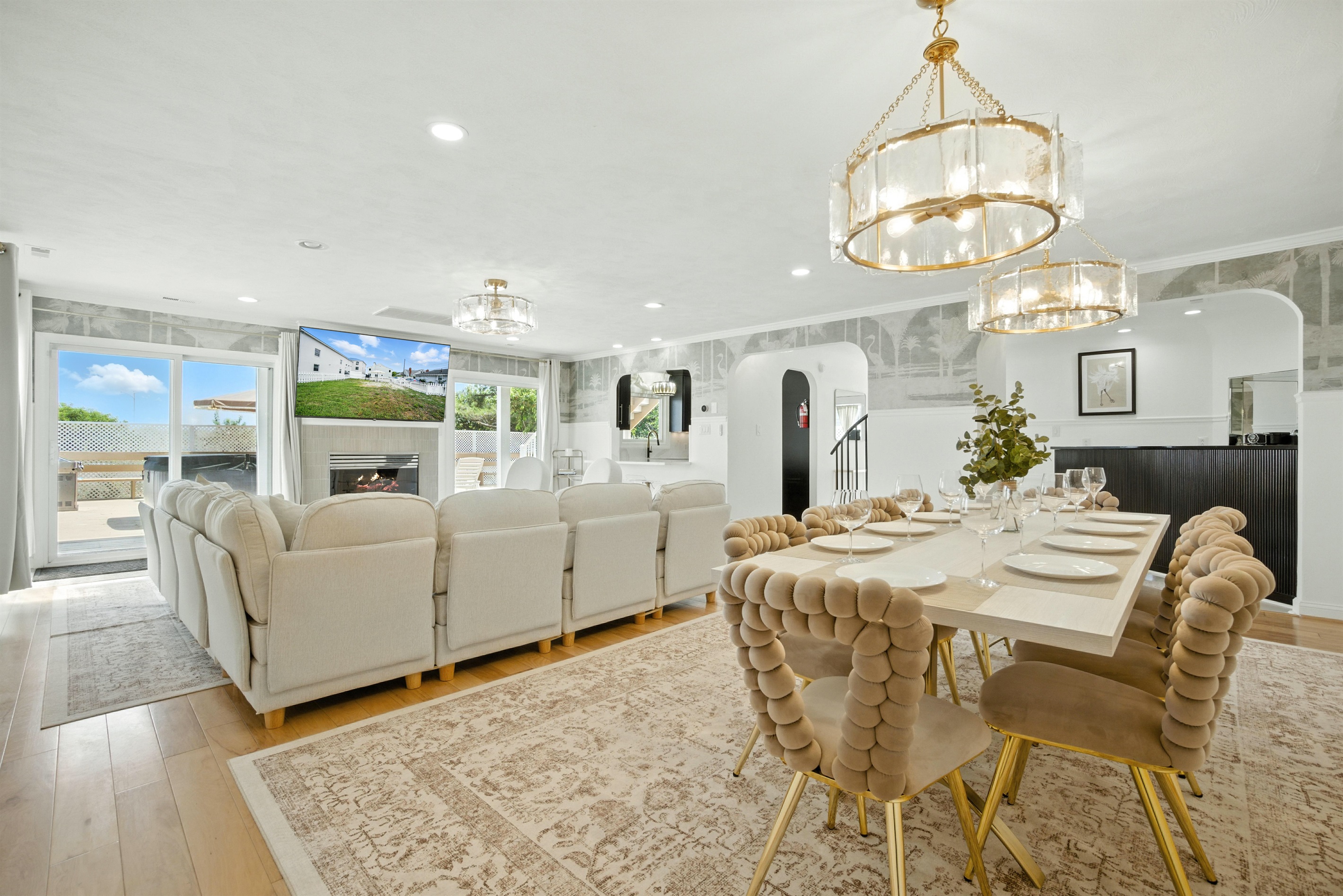 The Dining Room and Living Room are right off the Kitchen and Bar area, on the main level