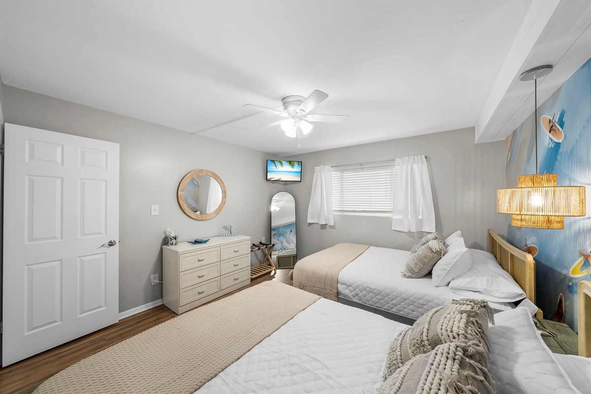 You will love the mornings waking up without an alarm in the Guest Bedroom boasting 2 brand new Queen size beds with fresh linens.
