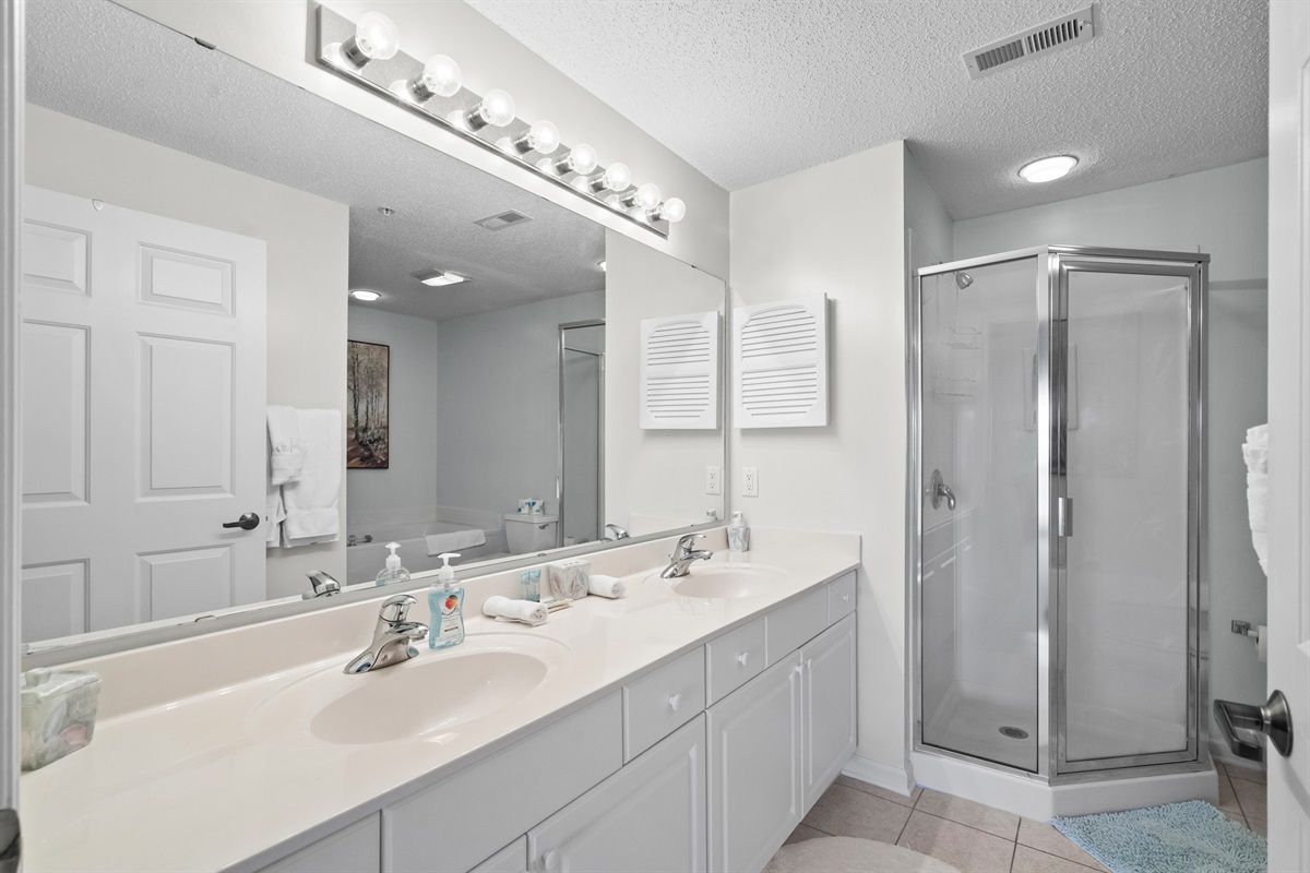 Separate Shower and large garden tub.
