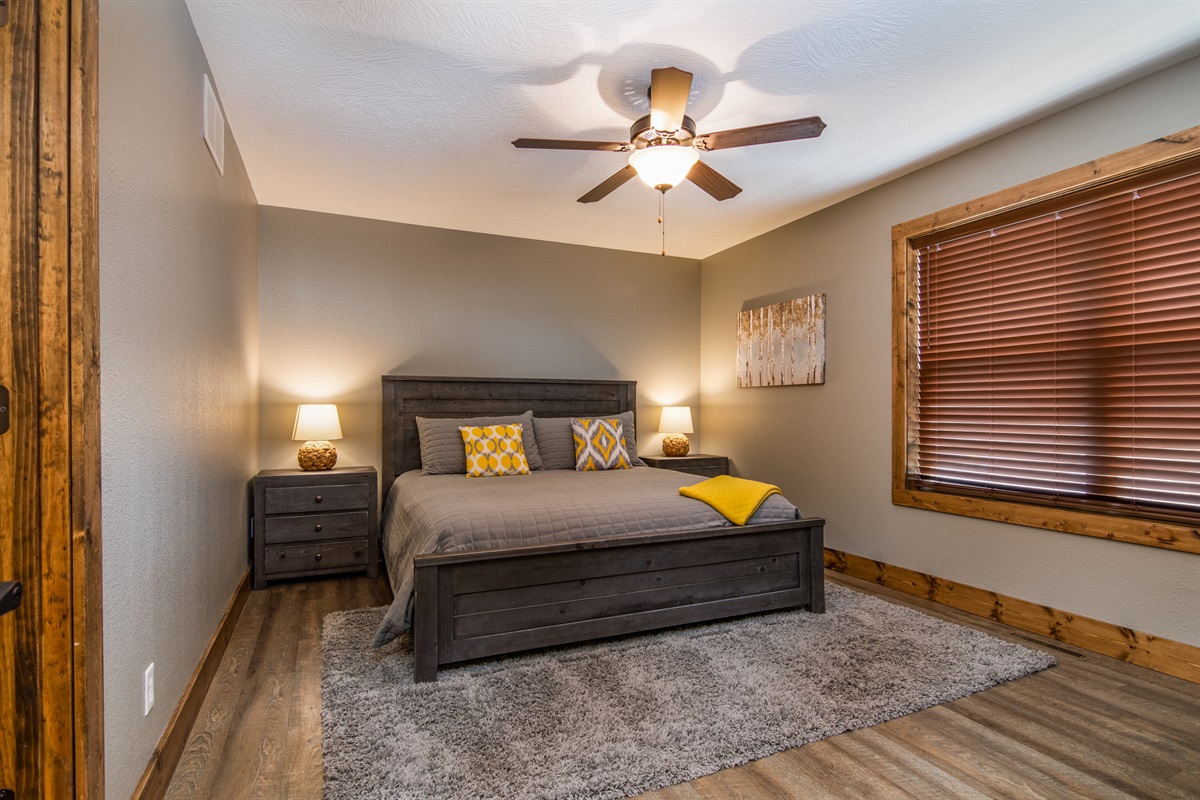 King size bed in one of our four spacious bedrooms