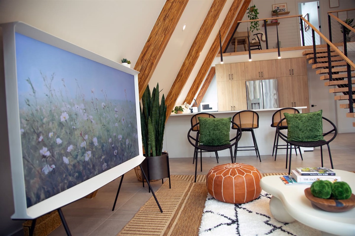 65 inch Sherif TV, it's almost like a painting,  cozy and perfect for gathering with friends/family