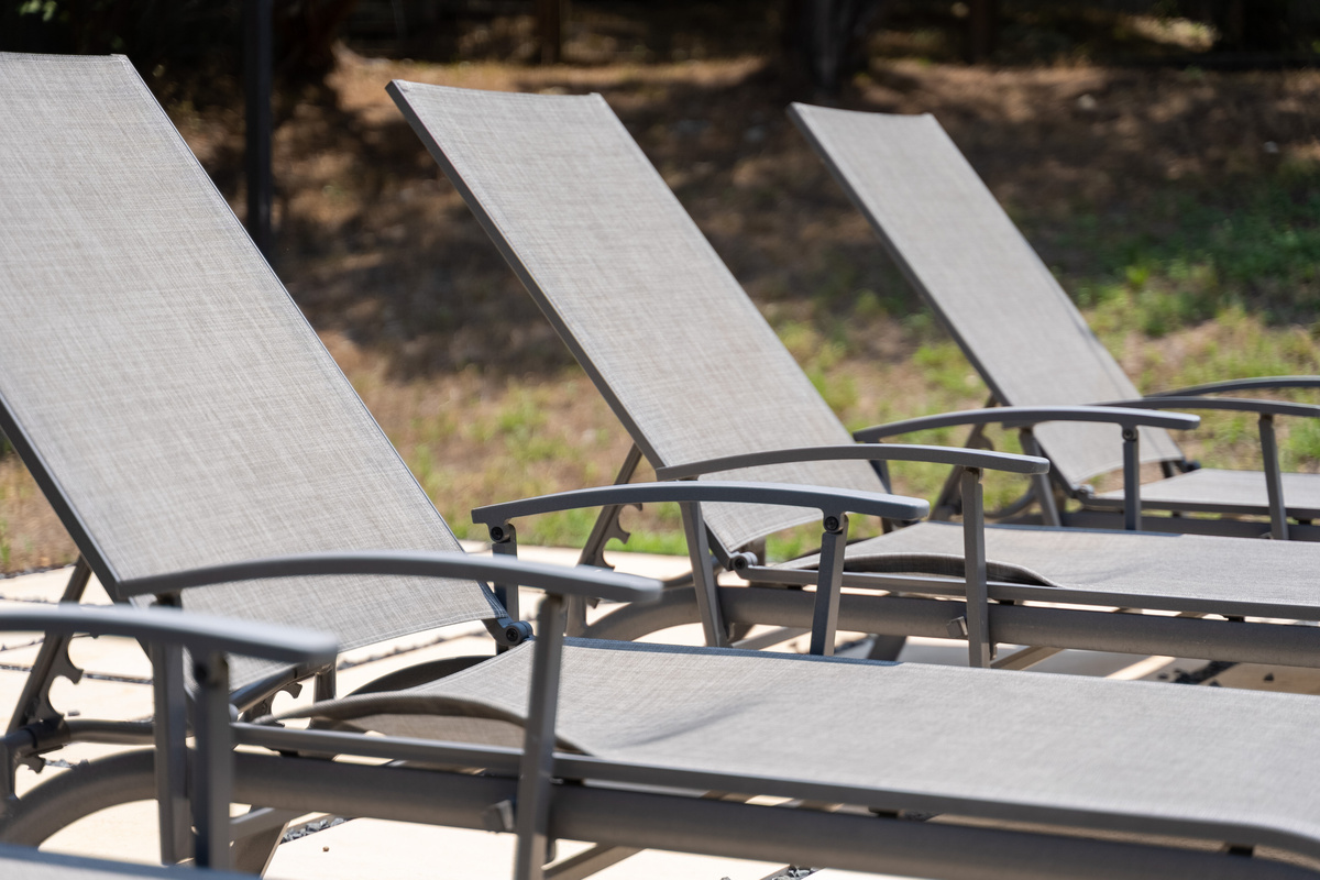 More poolside loungers await for ultimate relaxation.