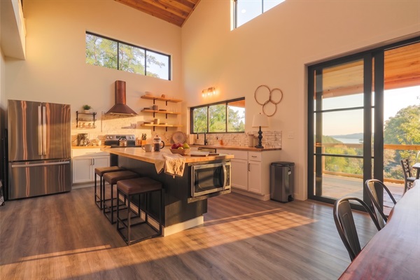 Kitchen opens straight to the deck and the water view, pass-through entertaining for a full house.