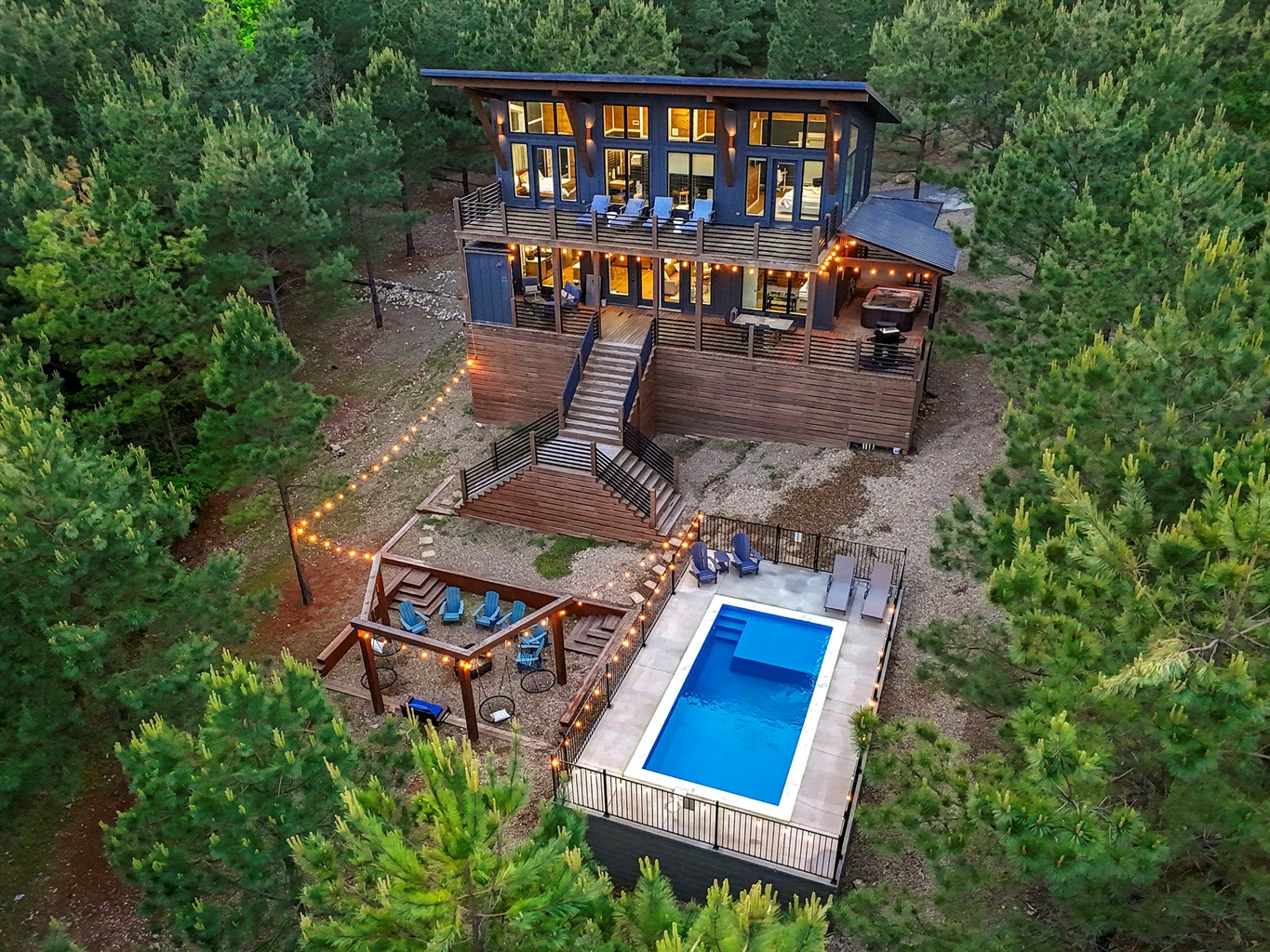 Luxury Broken Bow cabin with private pool, hot tub, fire pit, and panoramic forest views—your ultimate Woodland Oasis getaway in Hochatown.