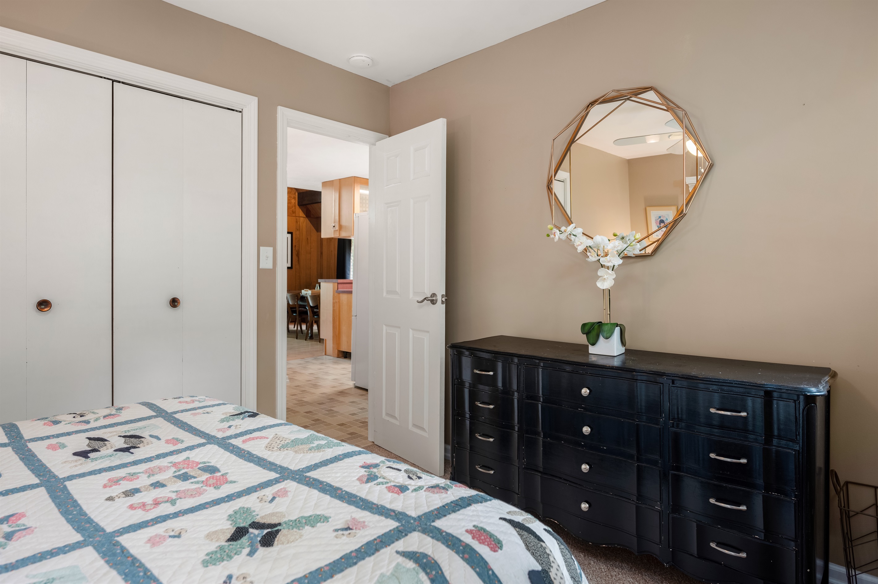 Hallway view connecting the main level bedrooms and bath