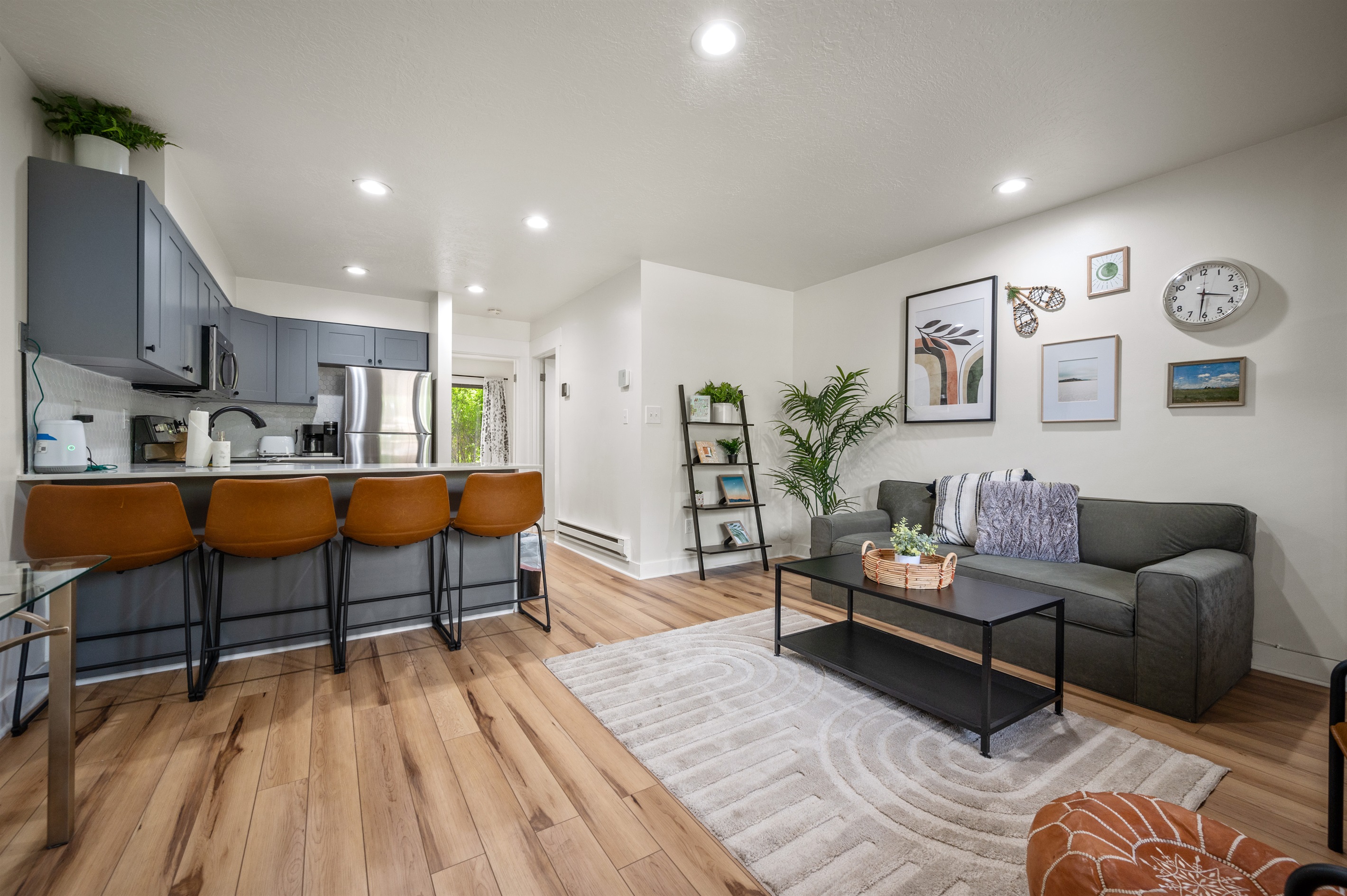 Open-concept design with living and kitchen areas that encourage inviting conversations.