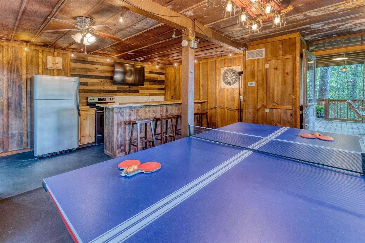 Ping-pong table in the game room and bar area.