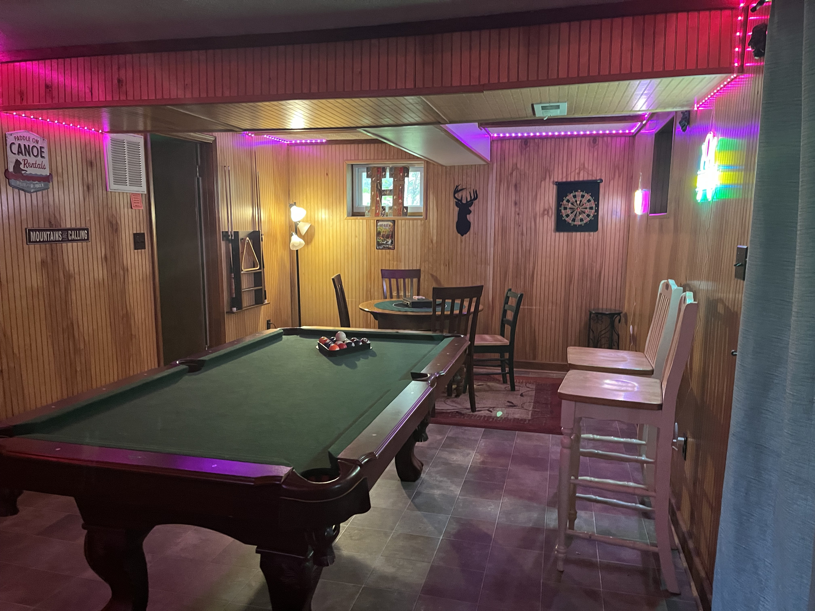 Relax downstairs with a game of pool or gather around the game table for cards, board games, or puzzles—the perfect spot to unwind after a day at the river.