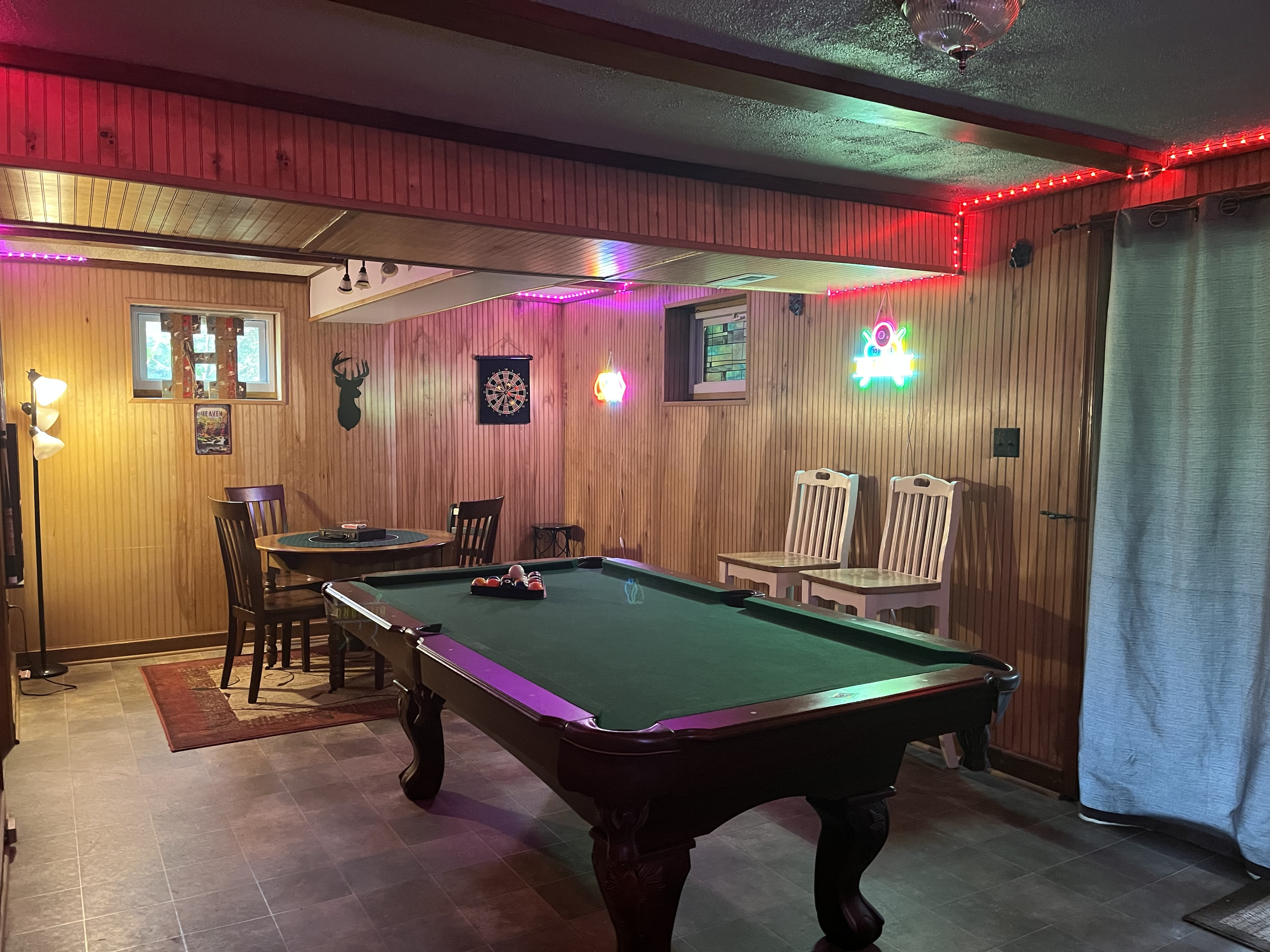 Relax downstairs with a game of pool or gather around the game table for cards, board games, or puzzles—the perfect spot to unwind after a day at the river.