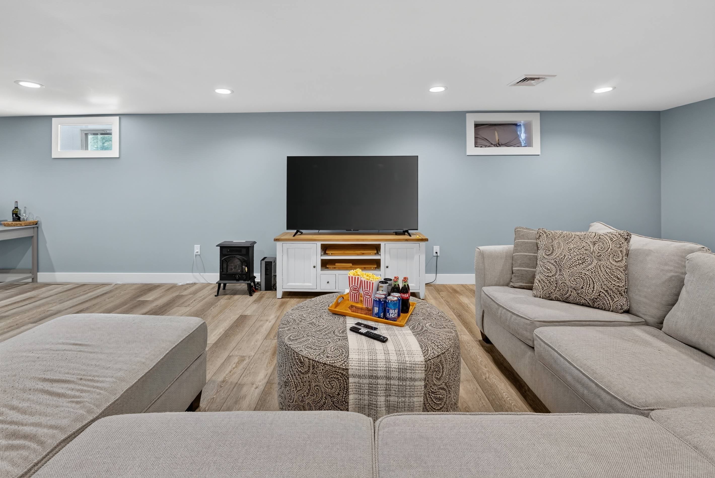 The perfect place to unwind with comfortable seating and entertainment for everyone.
