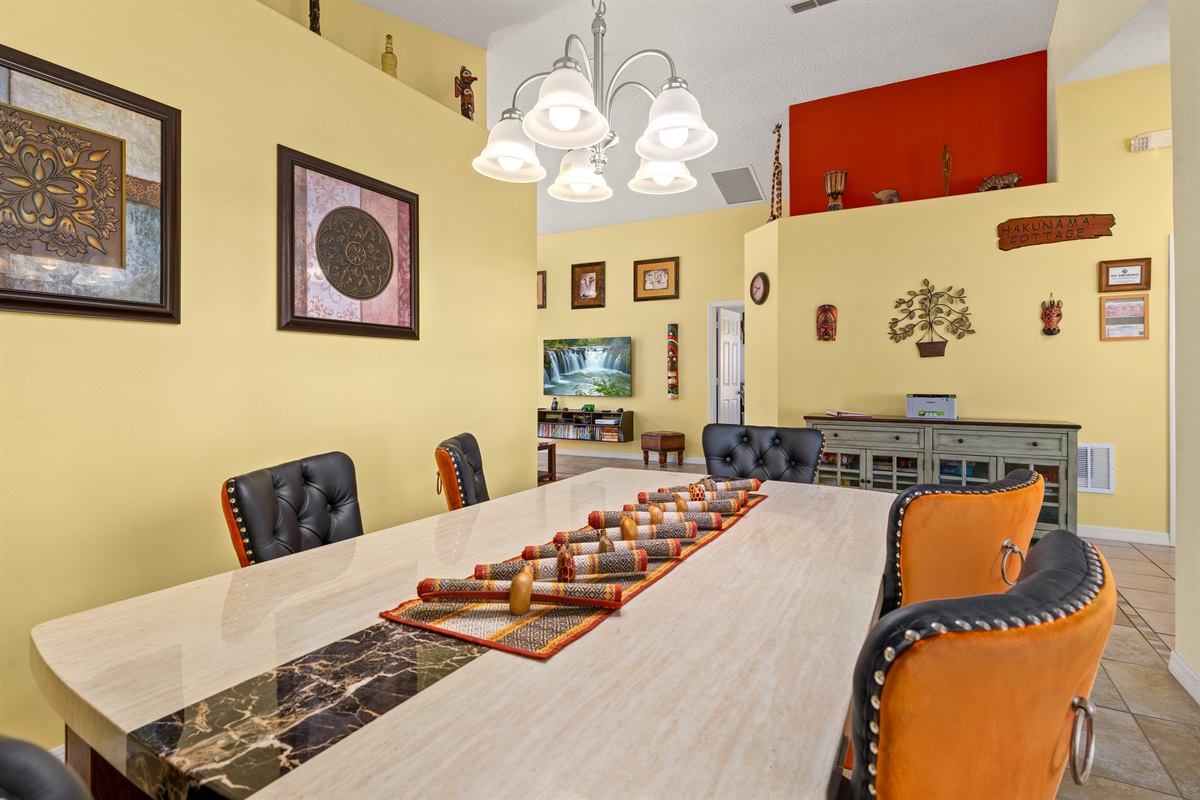 The dining room is open to the living room and entry hall.