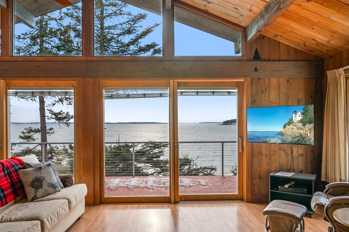 Walls of glass frame the ever-changing tides and western sunsets over Bass Harbor.