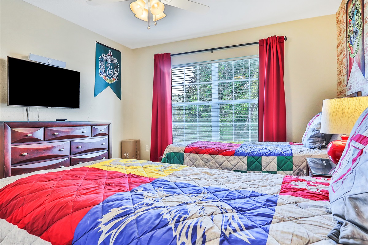 Harry Potter twin bedroom with 43" TV,. Now with luxury vinyl flooring.