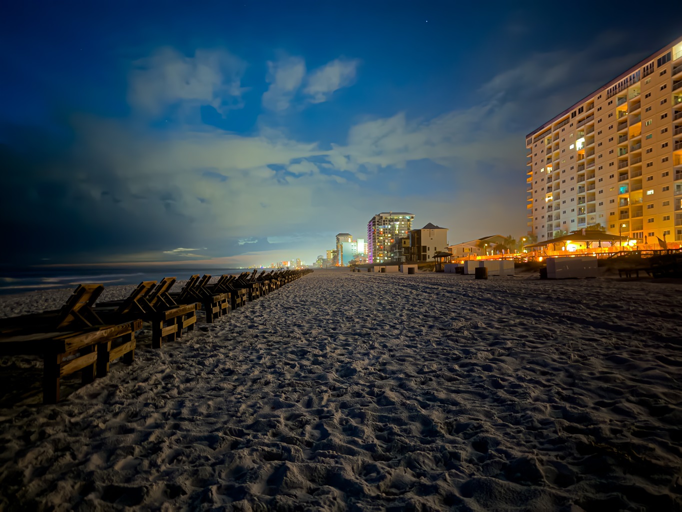 The nighttime beach will easily keep the kids entertained or perfect for a romantic stroll.