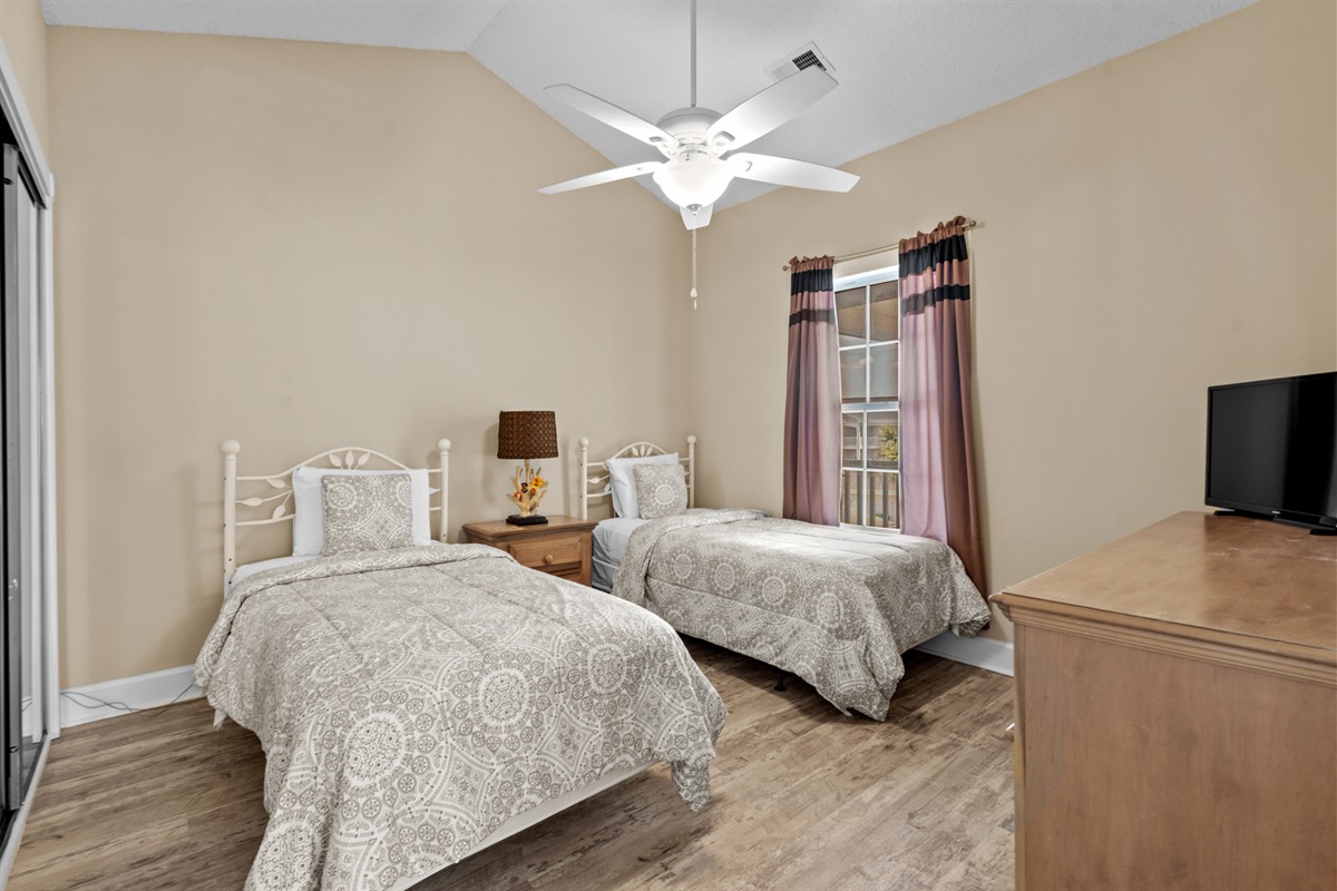 Third Bedroom with 2 Twin Beds, TV, and Storage
