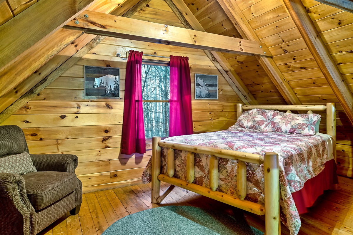 Loft with queen bed and reading chair