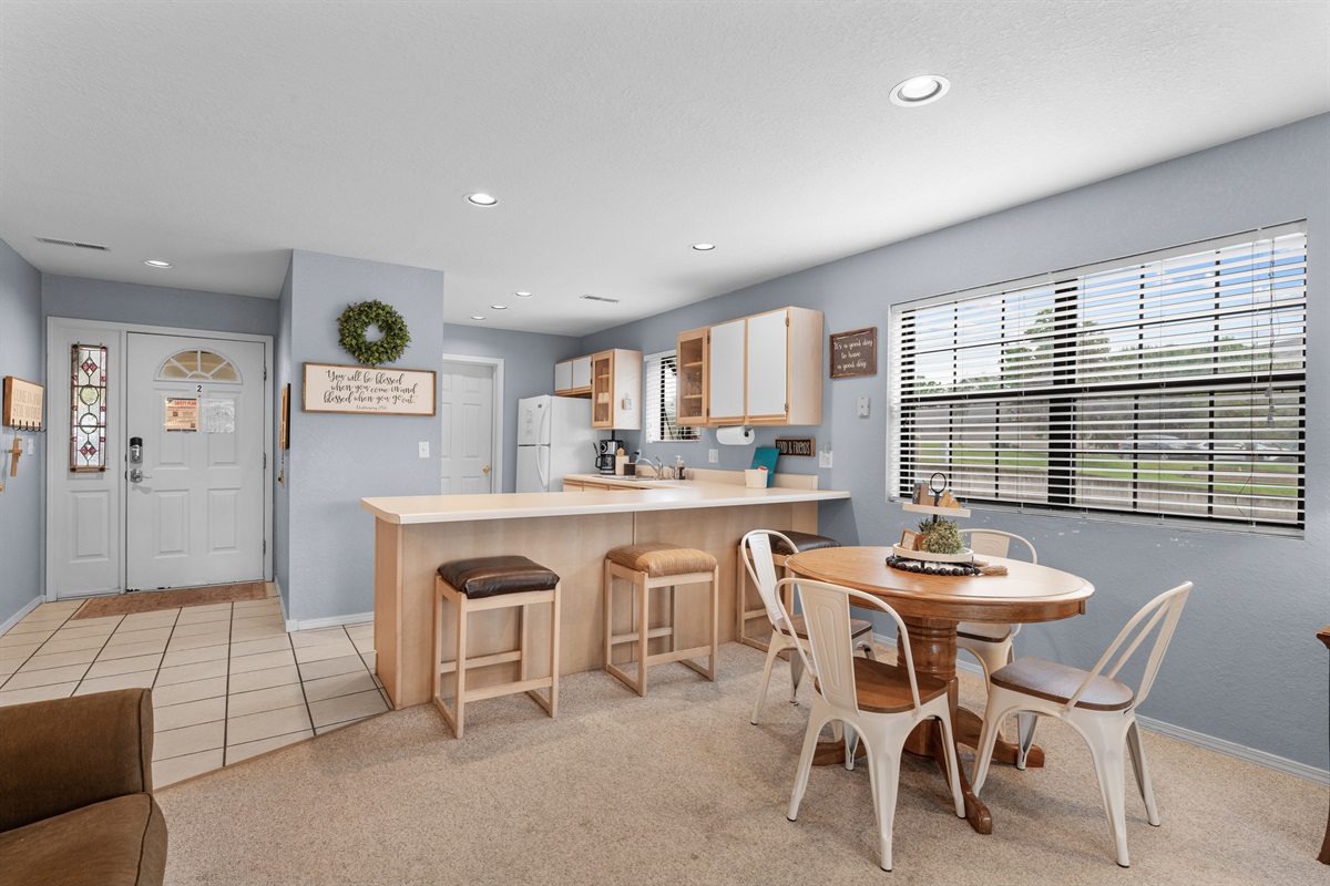 Dining table and bar seating give you flexible space for meals, coffee, or trip planning.