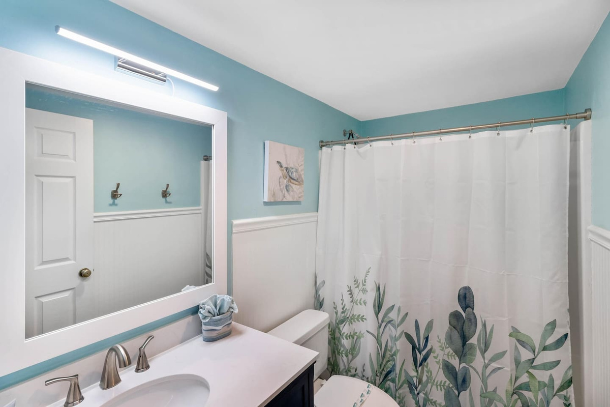 Find the second full bath serves the main level &mdash; convenient for guests using the living areas and the queen bedroom without having to go upstairs.