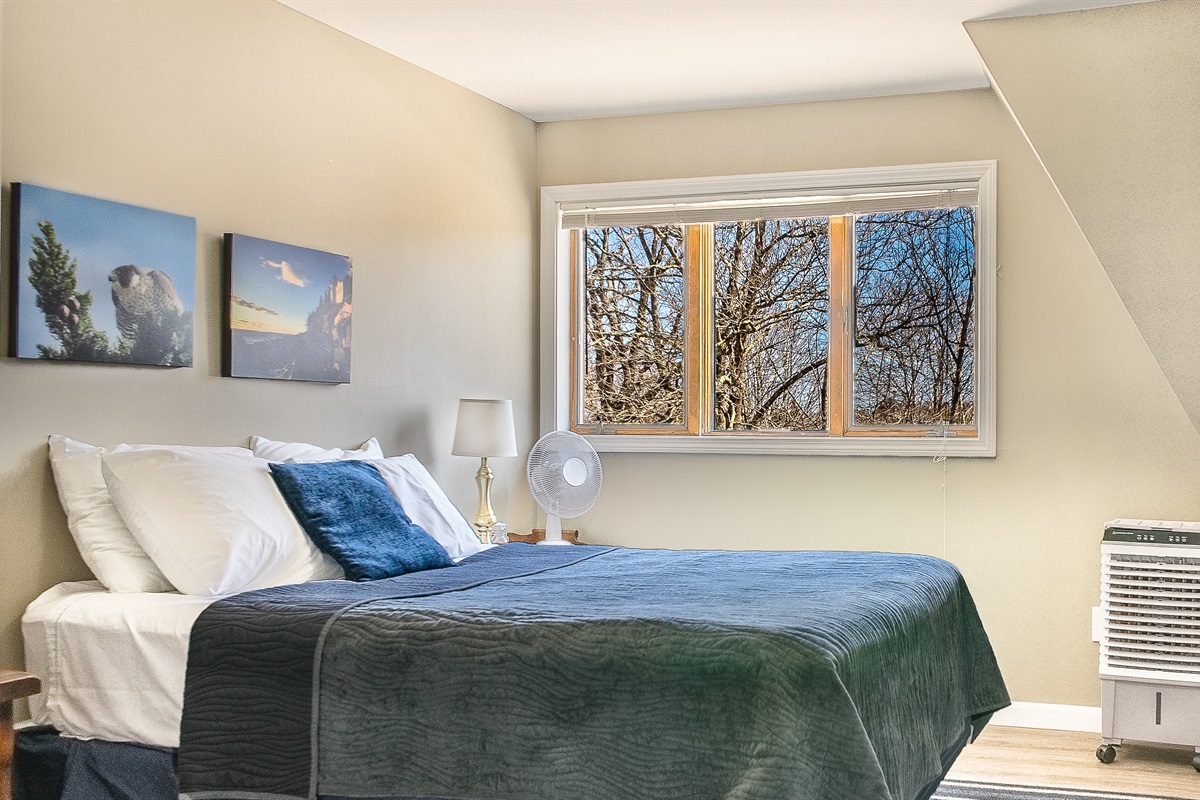 Beat the Maine humidity with our newly installed climate control. This queen guest room features a dedicated windowless AC unit, ensuring a cool, restful retreat after a day of hiking—an elevated comfort rarely found in historic maritime lofts.