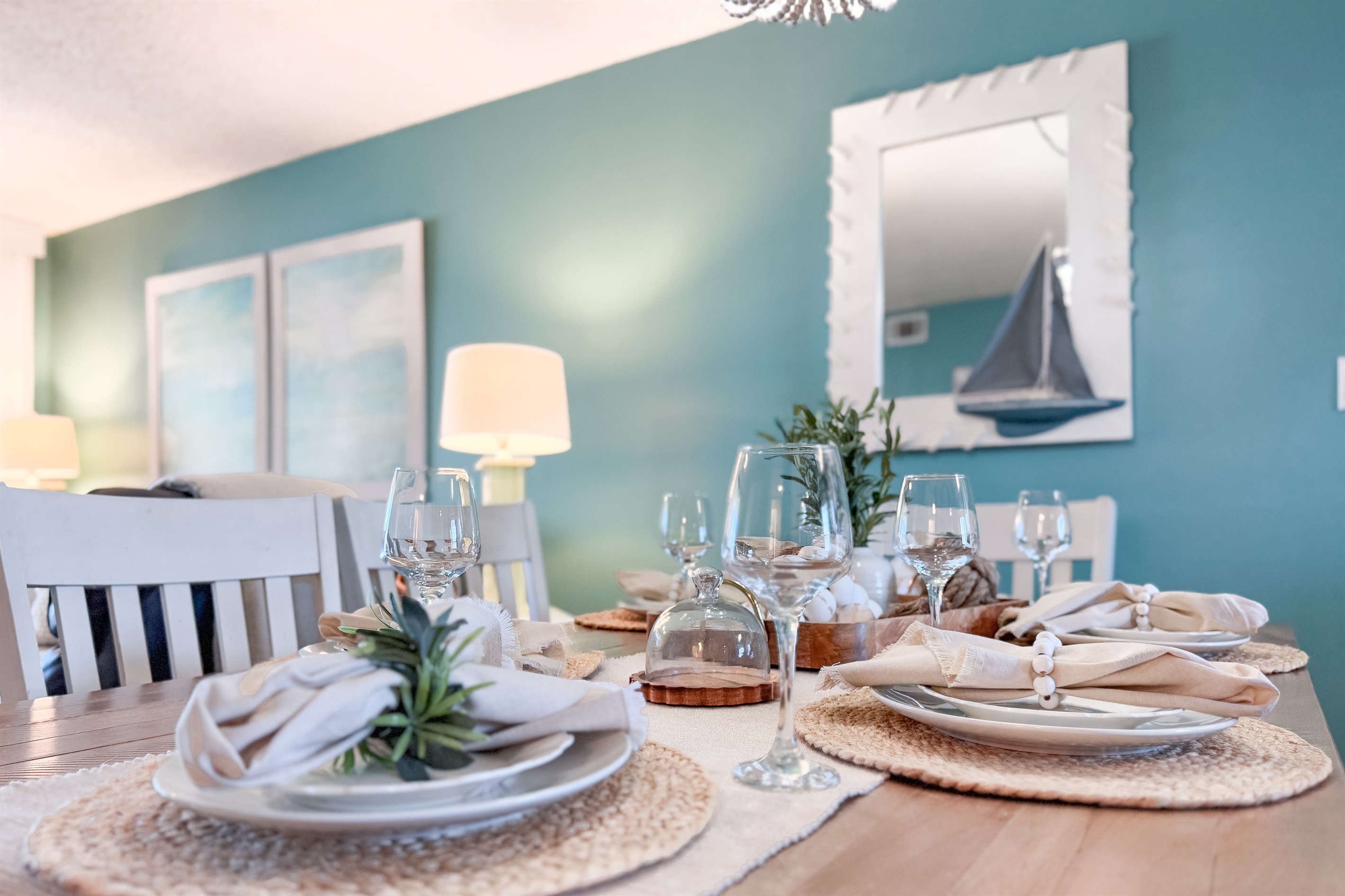 The natural textures and soft light create a serene atmosphere perfect for enjoying meals with a view.