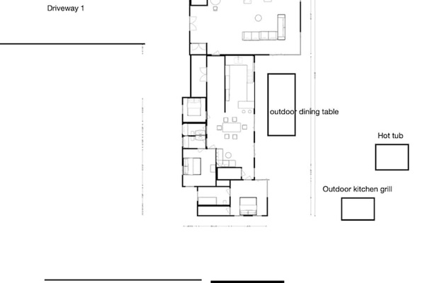 Partial layout of the house: entrance and driveway on the left and patio + outdoor area on the right