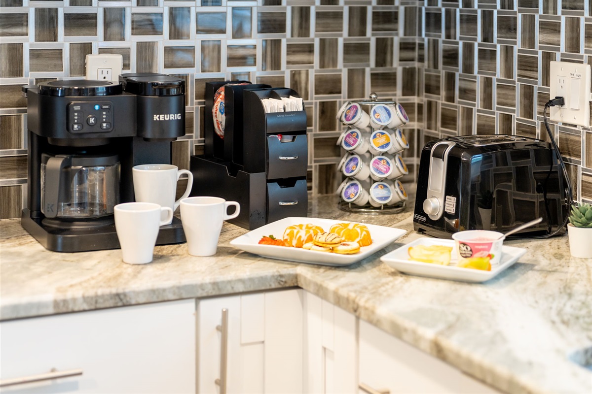 This kitchen is ideal for group stays, with ample counter space, generous cabinetry, and all the essentials you need to cook up family favorites.