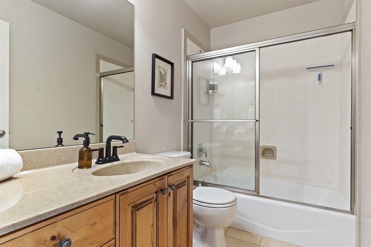 Full bathroom featuring a convenient shower/tub combination—perfect for a relaxing soak or a quick refresh.