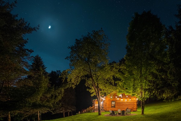 Cozy up under the stars ✨ Whether you're sharing stories by the fire or gazing at the crescent moon above, our firepit is the perfect place to unwind and take in the magic of the night sky at