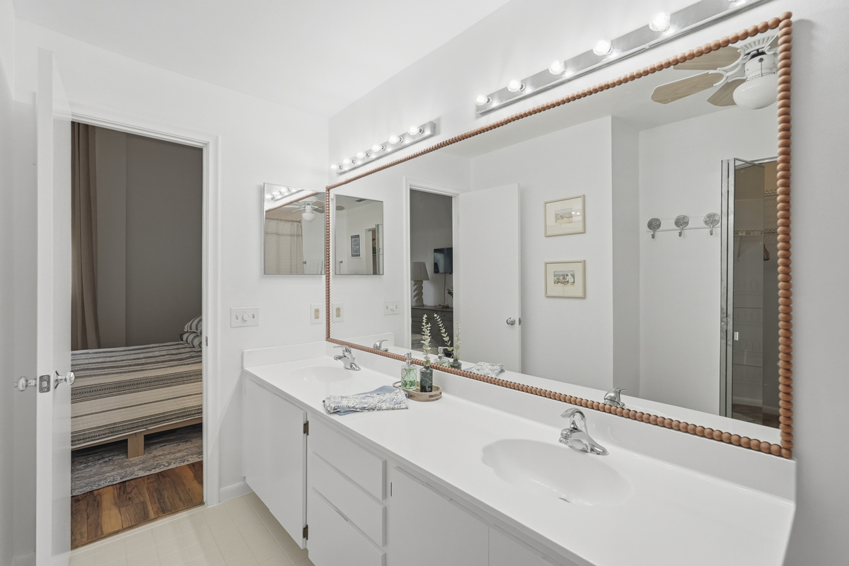 Connected to the primary bedroom, the ensuite bathroom offers added privacy and convenience, with everything you need to freshen up and get ready for the day.