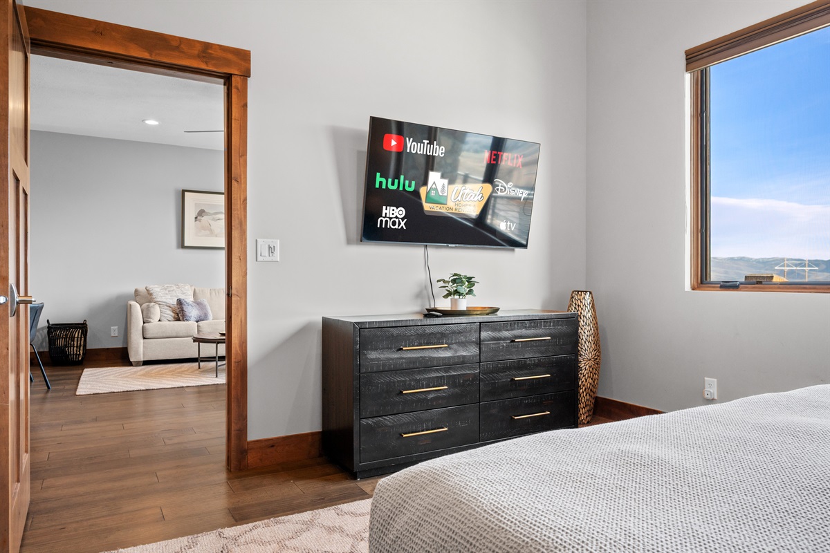 Bright primary bedroom filled with natural light