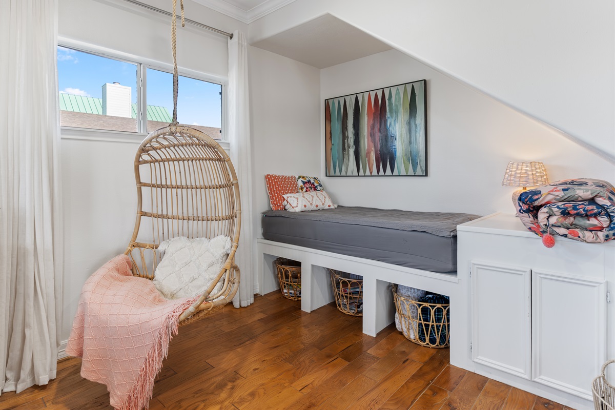 Twin bed in living room