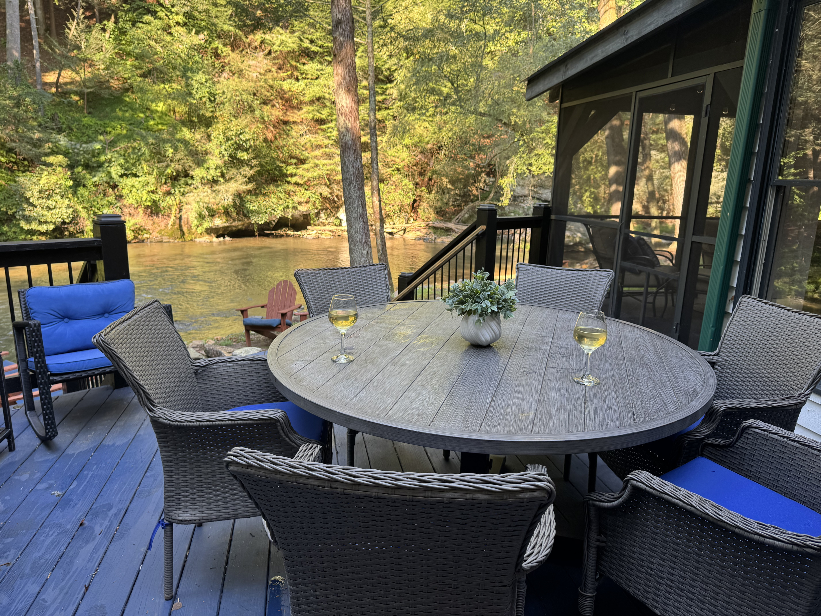 Enjoy meals, morning coffee, and river views from the spacious riverside deck.