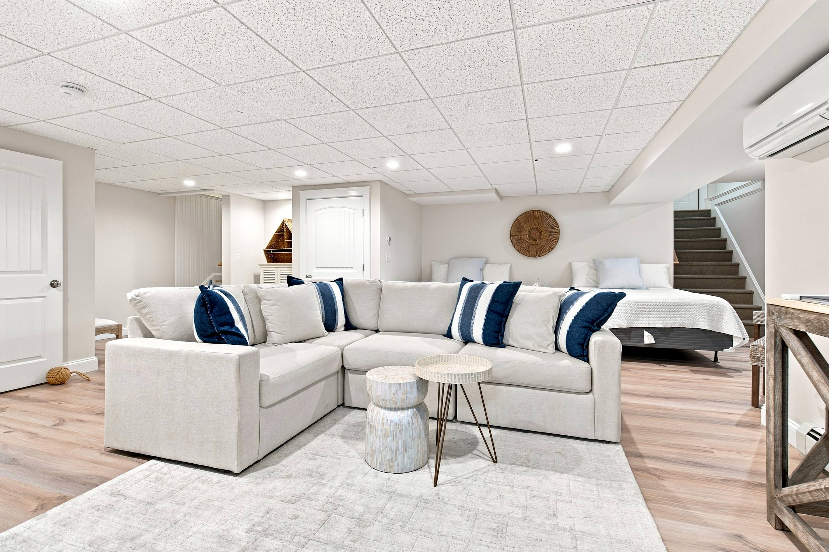 A spacious sectional and open layout make this lower-level lounge an ideal gathering spot for the group.