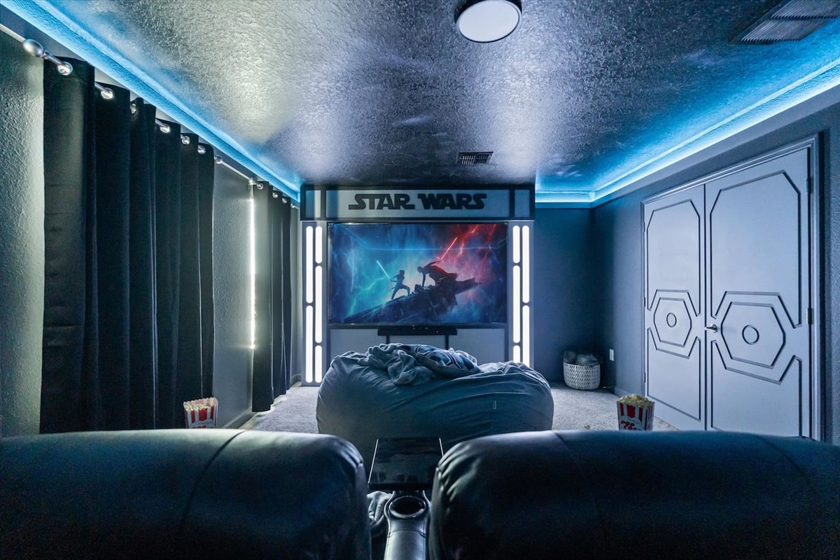 Enjoy a movie in the Star Wars themed theater room on our 98" screen TV.