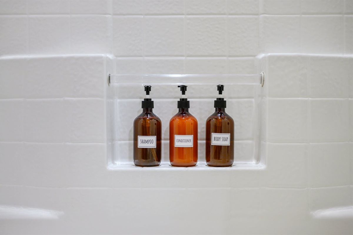 Shampoo, conditioner, and body soap available in every shower.