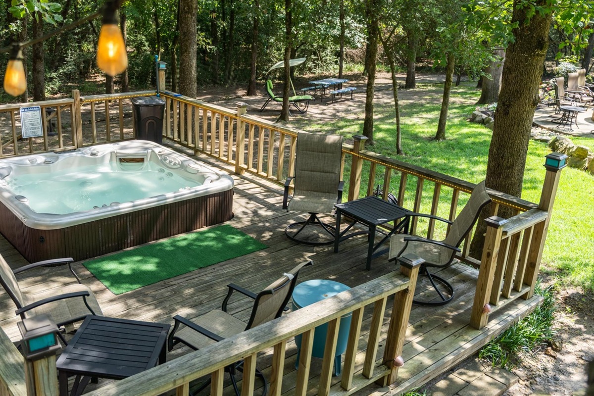 The hot tub area is spacious and thoughtfully designed—not just for soaking, but for socializing too! With plenty of seating nearby, it’s the perfect place to unwind and conversate.