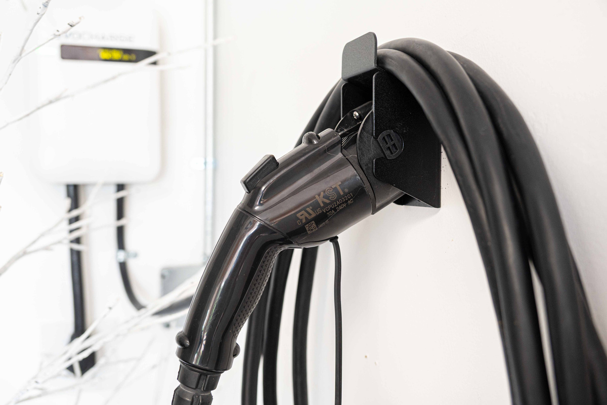 {Garage} Level 2 EV charger available during your stay.