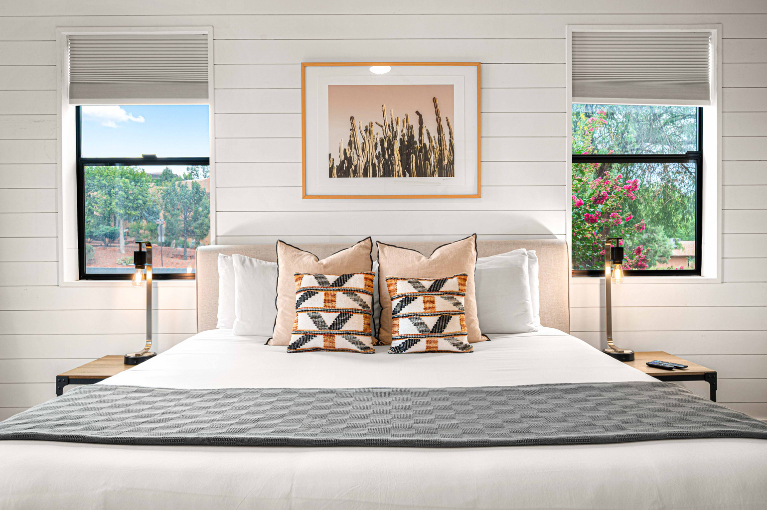 {Bedroom 1} Retreat to a luxurious king bed in this bright, serene suite with its own private spa-inspired ensuite bath.