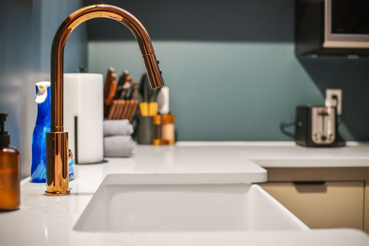 Thoughtful details and modern fixtures add a touch of elegance throughout the space.