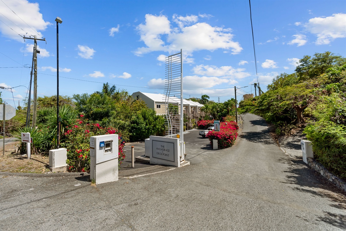 Entrance to Anchorage Condos. Continue past the first turn on the left (pictured) and turn in the second entrance.