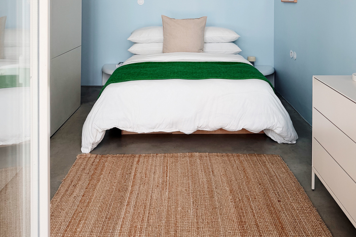 Bed with hybrid mattress and full dresser.