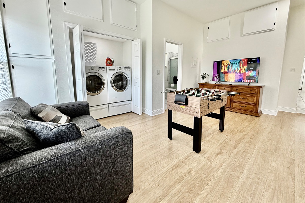 Keep the fun going while the laundry’s spinning! This versatile space features a foosball table for friendly competition and a washer/dryer to keep everything fresh during your stay.