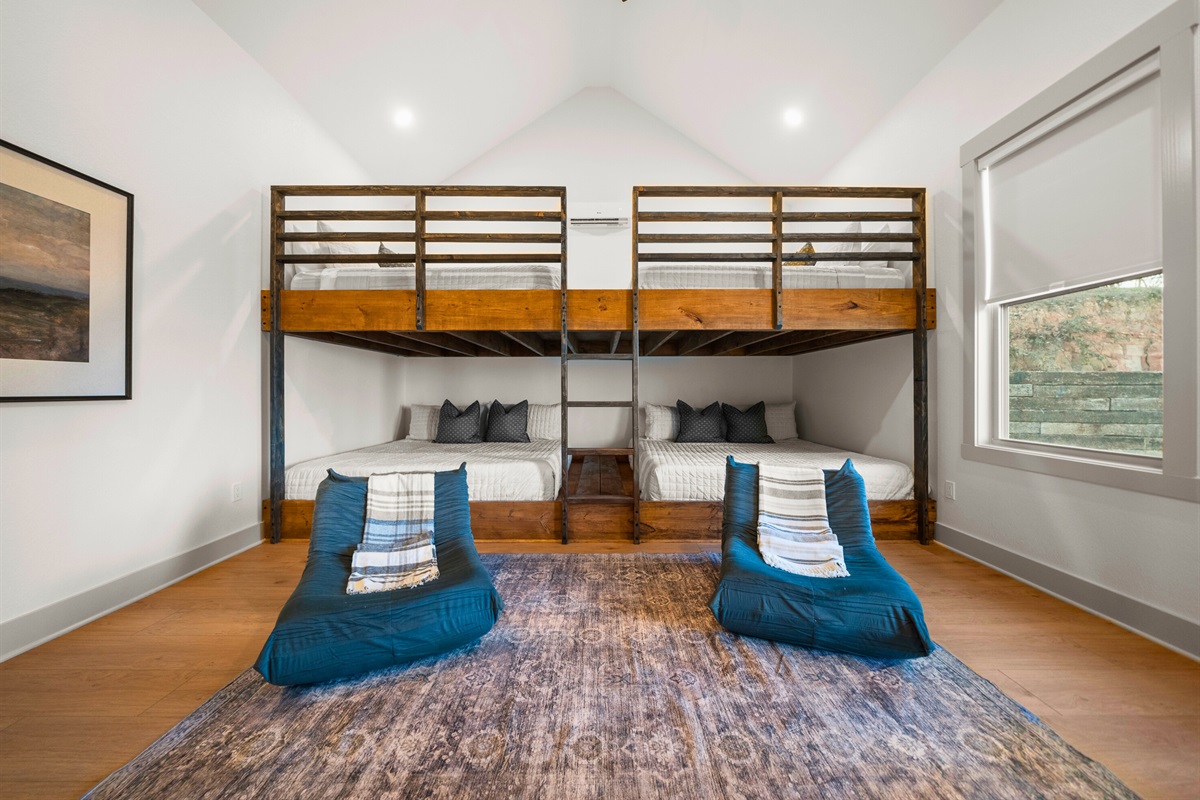 With built-in bunks and room to lounge, this space is ideal for kids, teens, or anyone who loves a cozy group setup.