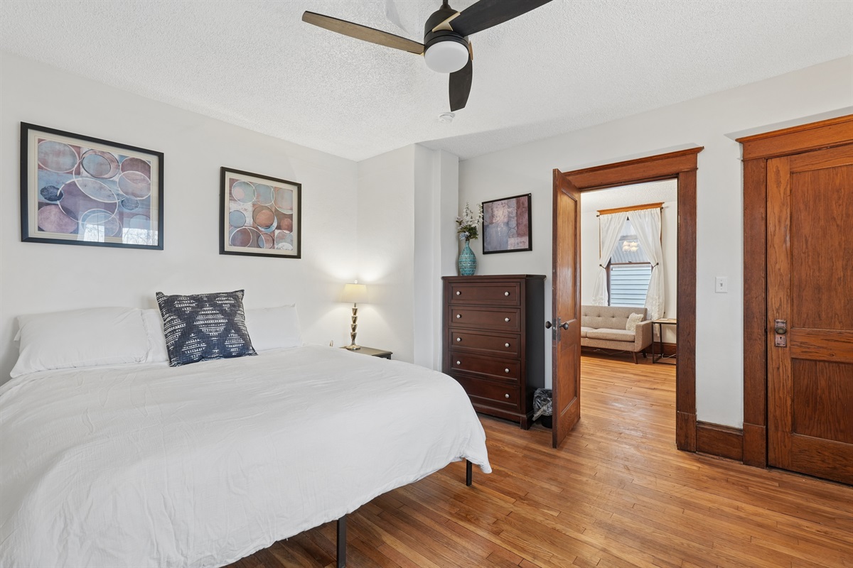 This comfortable king bedroom is right off the living room and overlooks the quiet cul-de-sac.