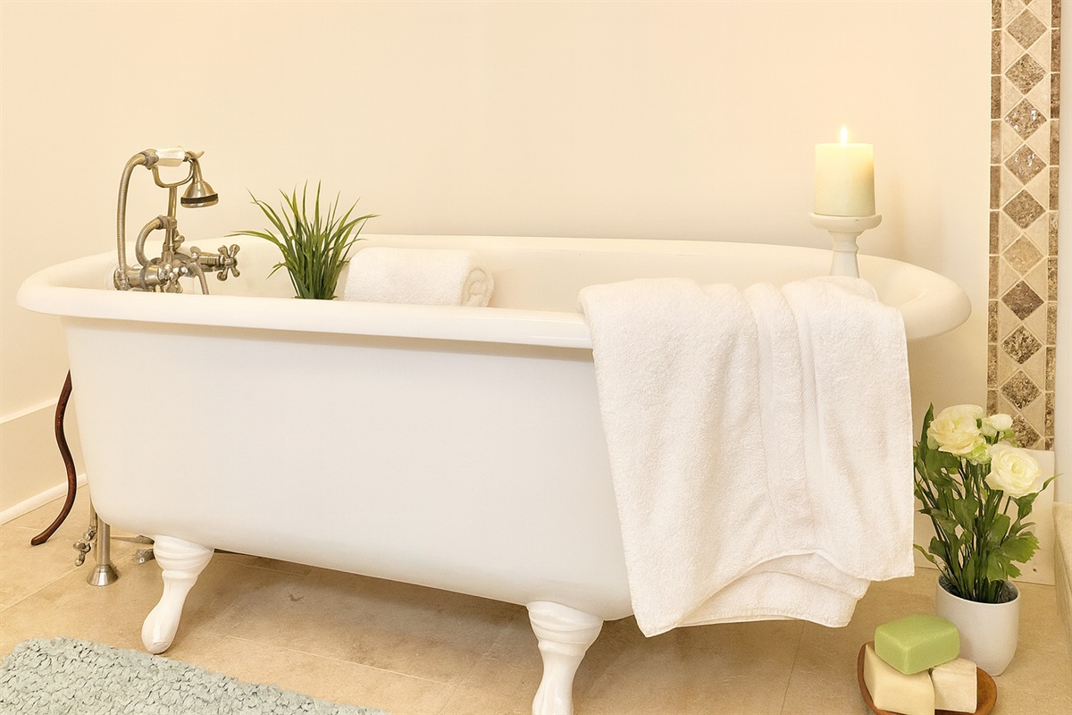 Relax in the claw foot tub in Primary Bath