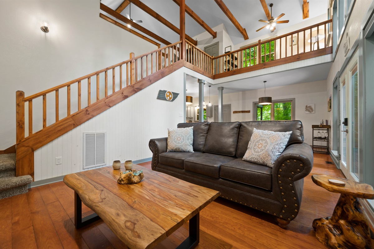 The upstairs reading nook overlooks the spacious living room.