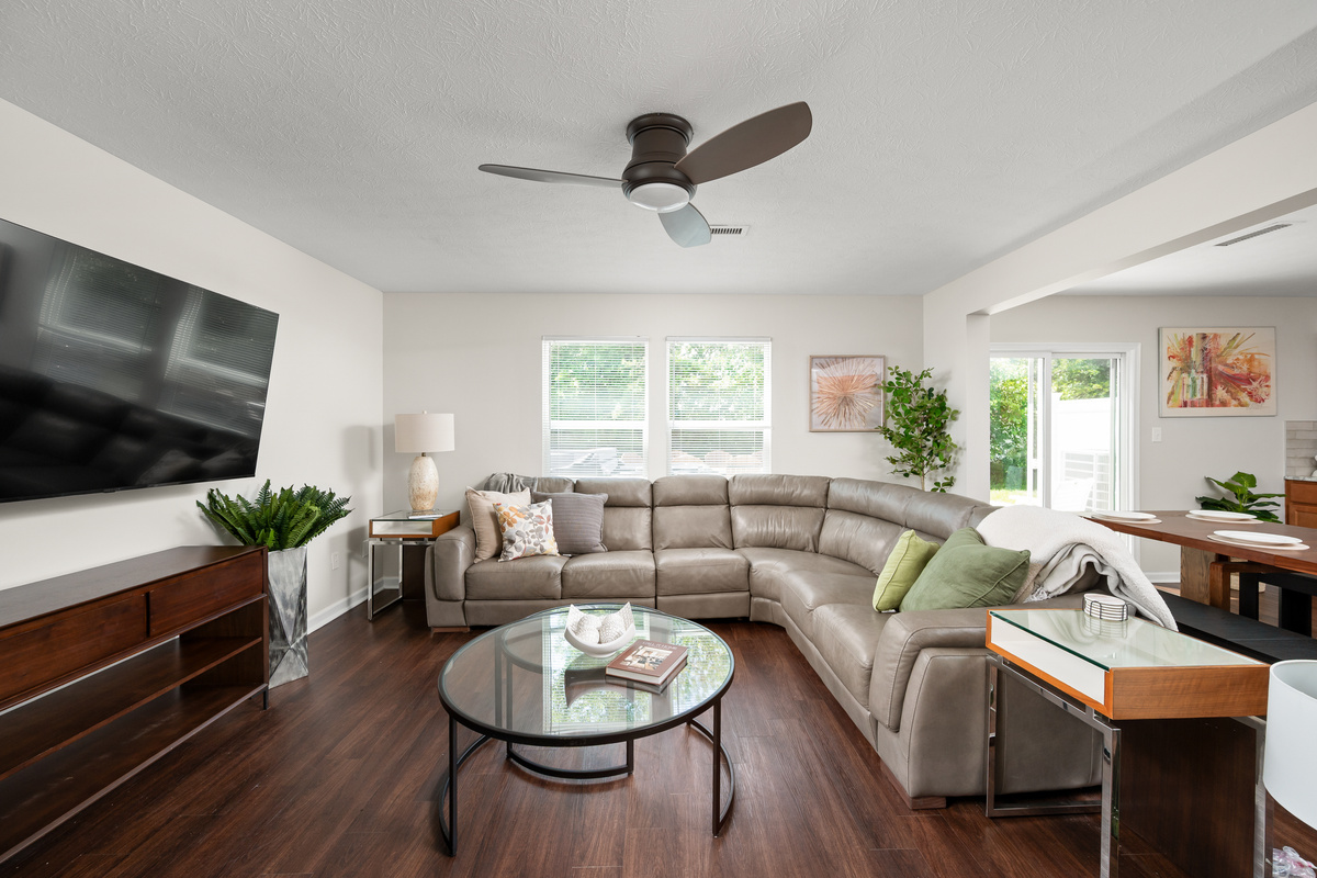 Stretch out on the oversized sectional with plenty of seating for the whole group and enjoy movie nights, race coverage, or your favorite streaming shows on the large Smart TV.