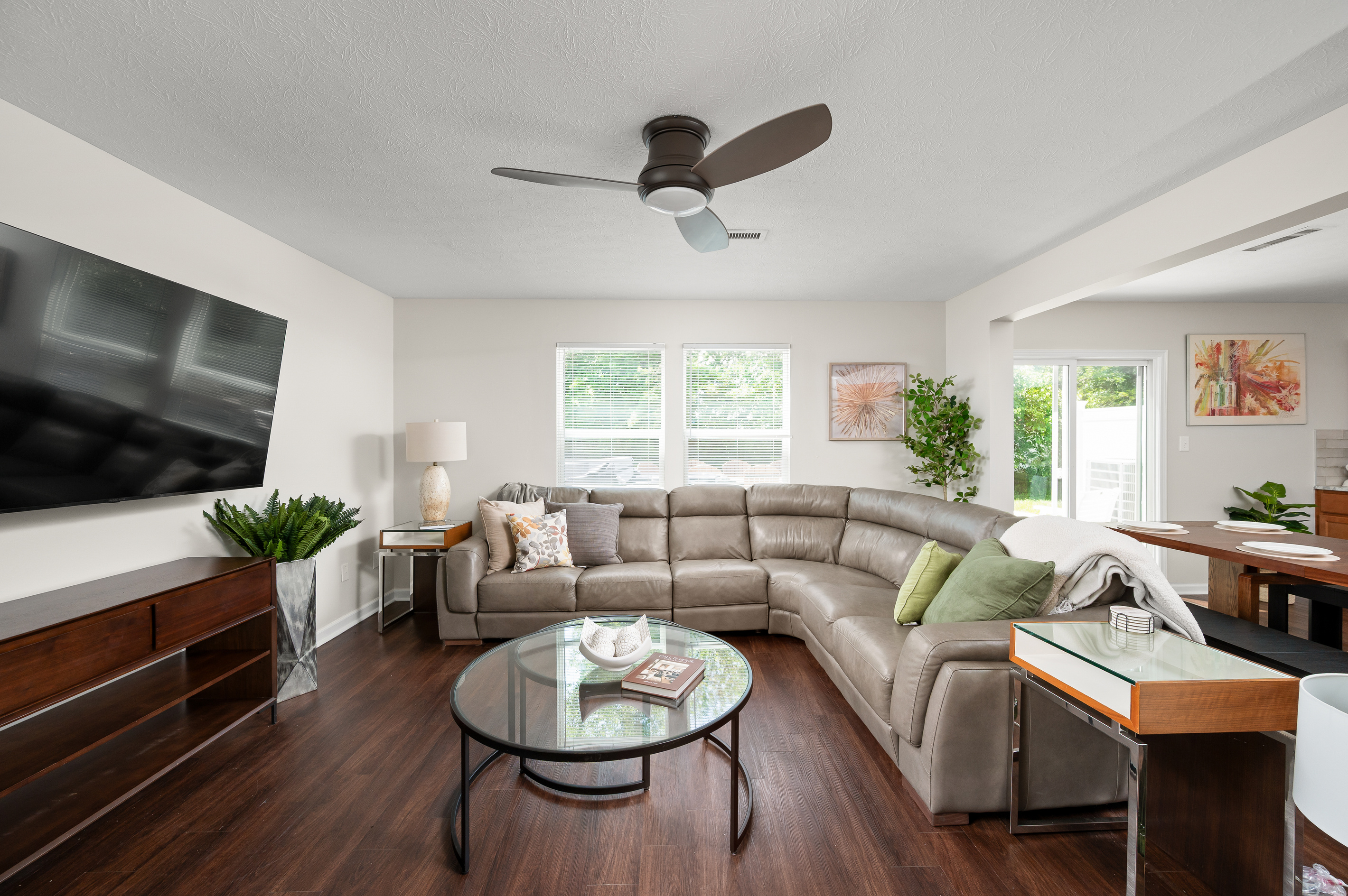 Stretch out on the oversized sectional with plenty of seating for the whole group and enjoy movie nights, race coverage, or your favorite streaming shows on the large Smart TV.